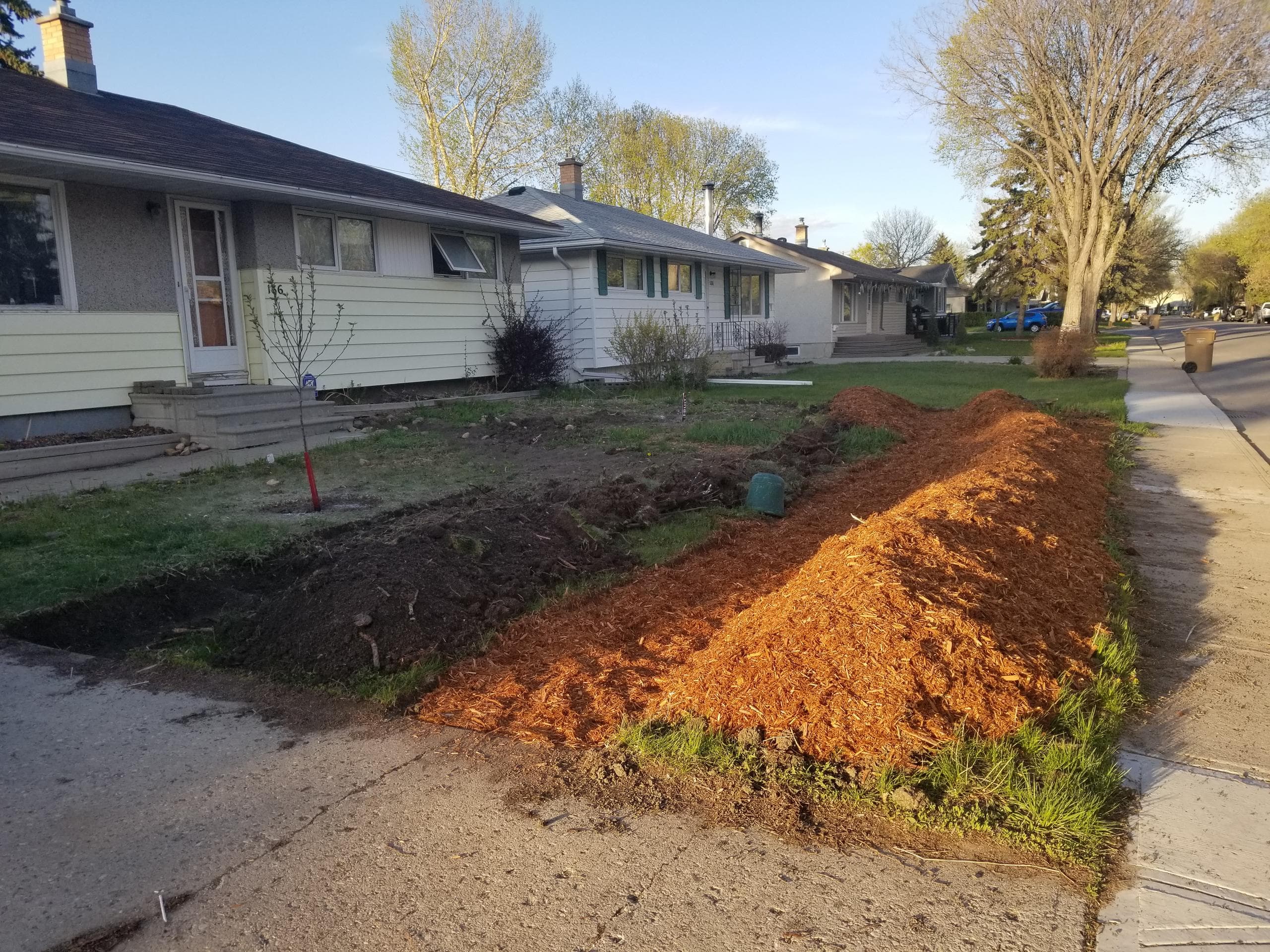 Photo of one finished trench/mound pair.